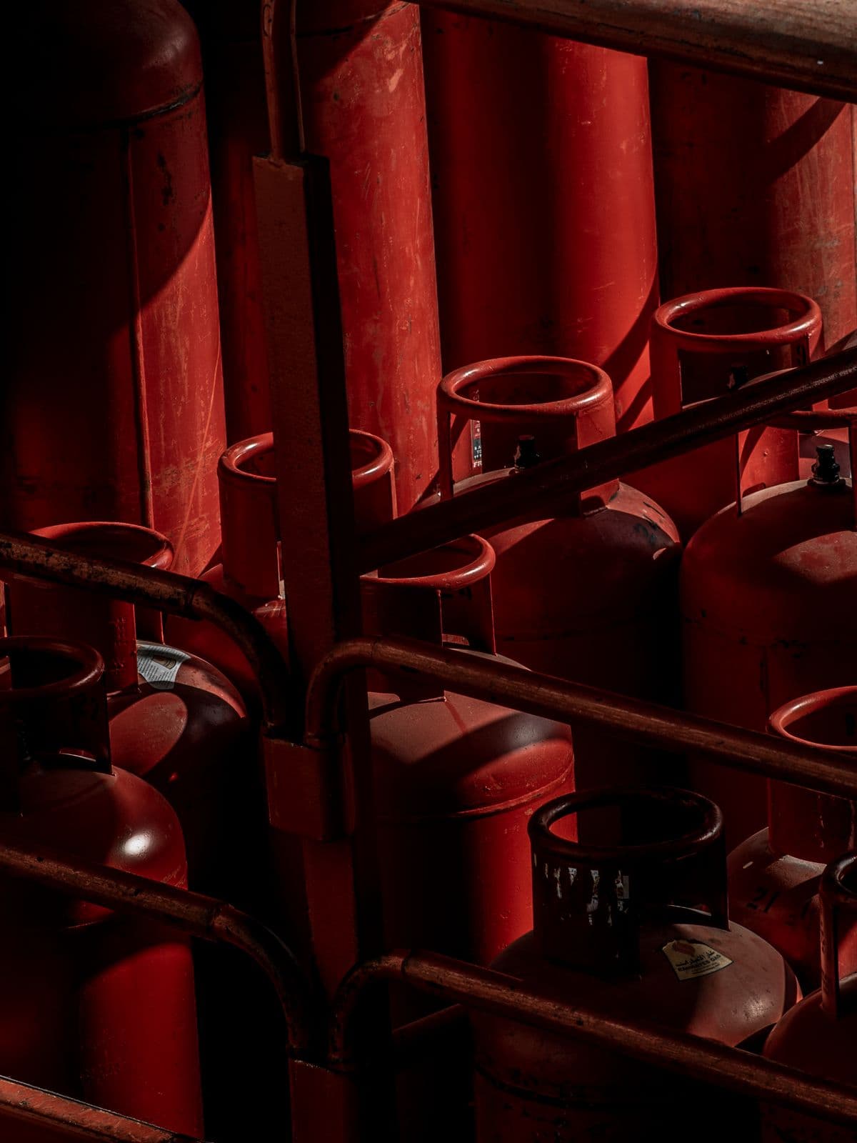 Full gas cylinders racked at a depot